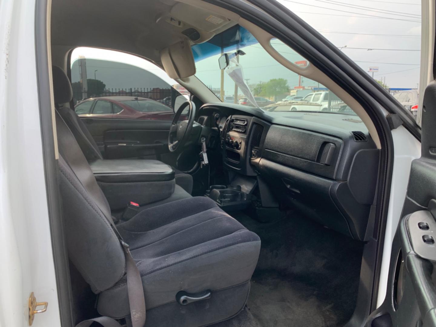 2004 White /Black Dodge Ram 1500 Laramie 2WD (1D7HA16N44J) with an 4.7L V8 SOHC 16V engine, Automatic transmission, located at 1830 North Belt Line Road, Irving, TX, 75061, (469) 524-0199, 32.834373, -96.993584 - Photo#6